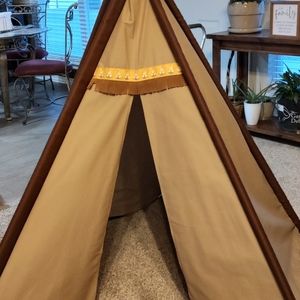 Tan colored childs teepee